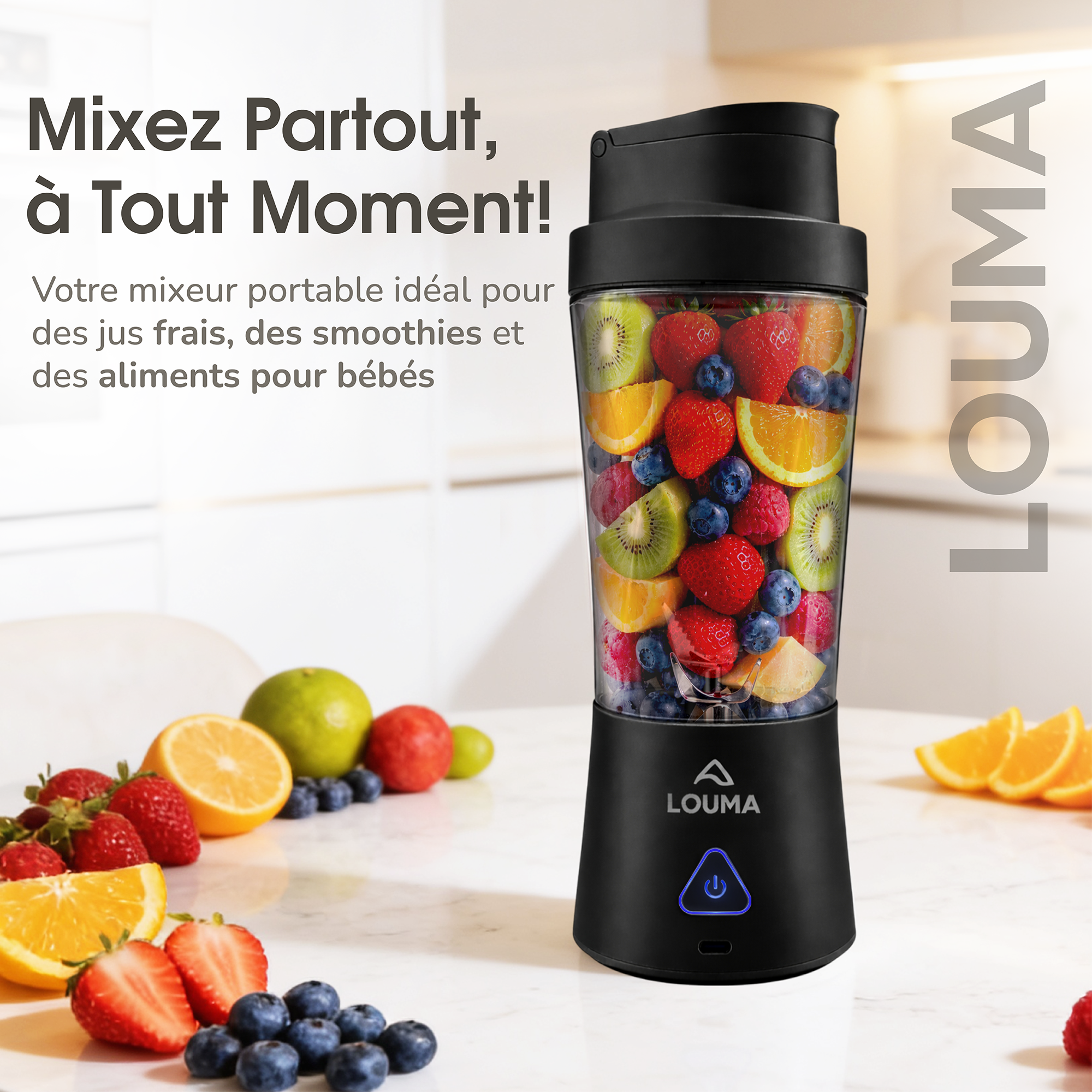 Blender portable noir Louma posé sur un plan de travail avec fruits frais.